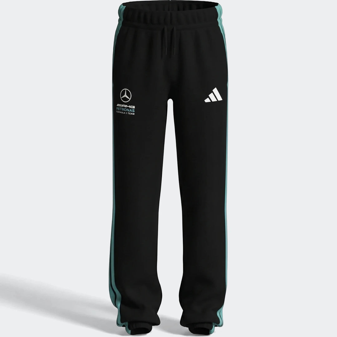Kids' Mercedes-AMG Petronas Formula 1 Team DNA Pants in black with teal stripes, shown in a flat-lay view.