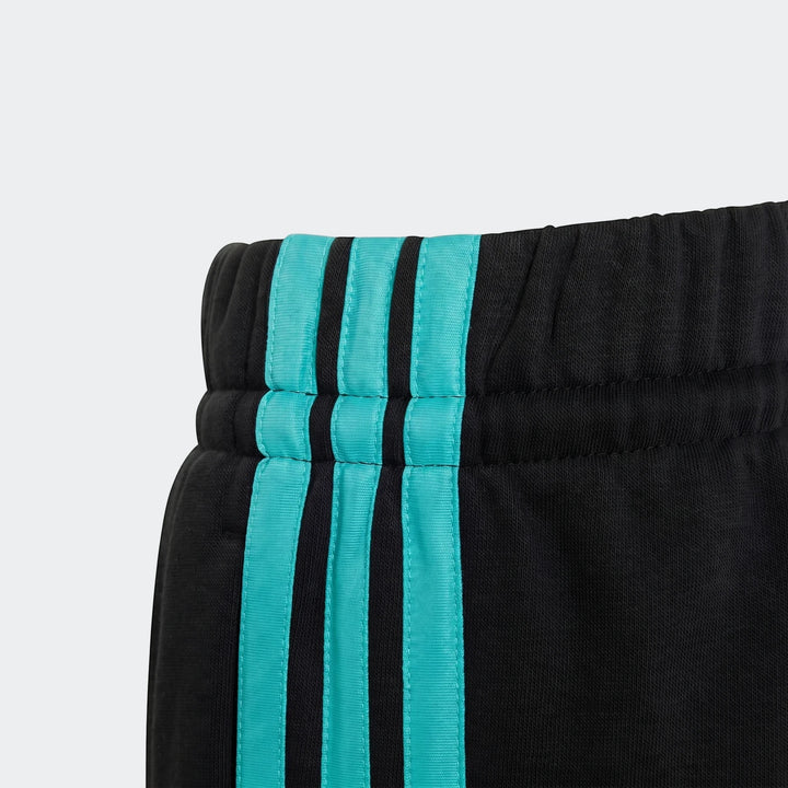 Black kids' Mercedes-Amg Petronas Formula 1 Team Dna Pants with vibrant turquoise stripes, showing textured fabric and