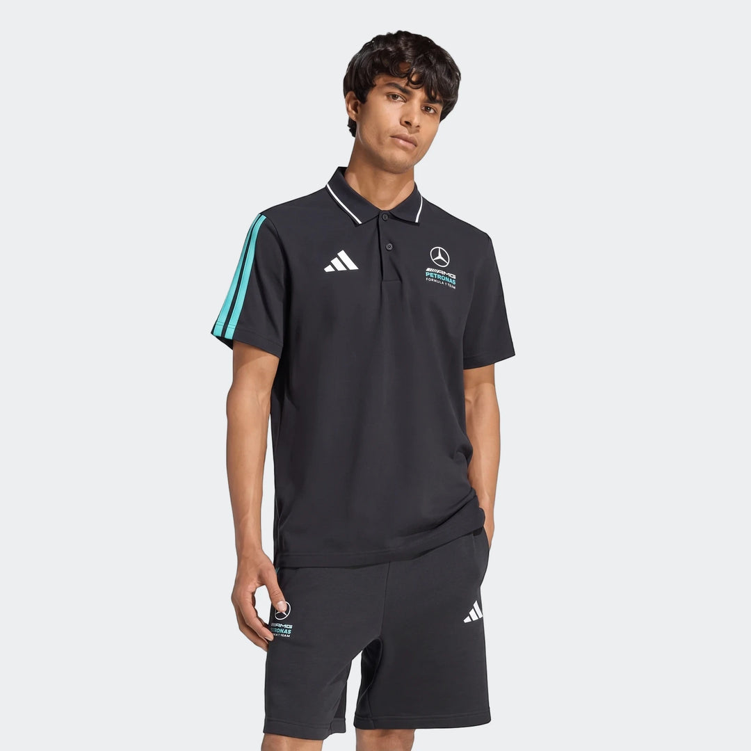 Mercedes-Amg Petronas Formula 1 Team Dna Polo Shirt on a male model, black with white collar, turquoise stripes, and brand