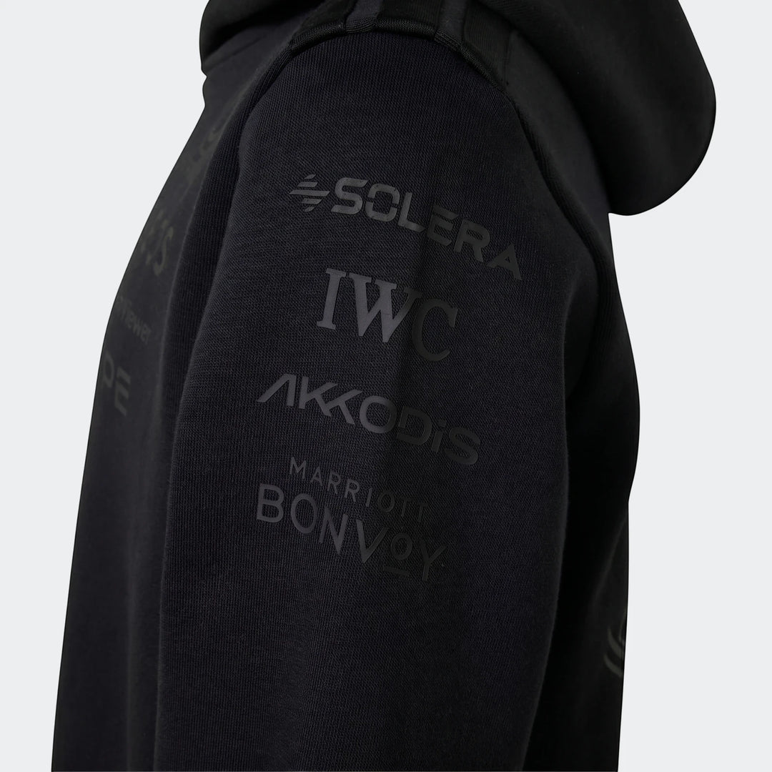 Youth Mercedes-Amg Petronas Formula 1 Team Night Driver hoodie in black, featuring multiple sponsor logos on the sleeve,