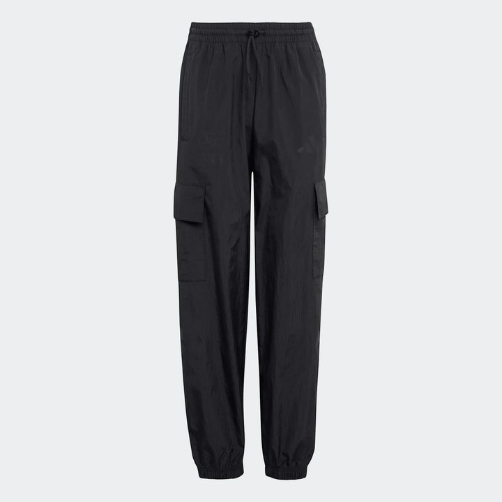 Black Mercedes-AMG Petronas Formula 1 Team Youth woven pants with cargo pockets on a studio background.