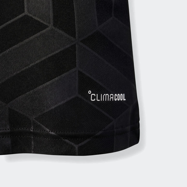 Close-up of a black Mercedes-Amg Petronas Formula 1 Team Driver Youth Jersey hem with white Climacool logo and geometric