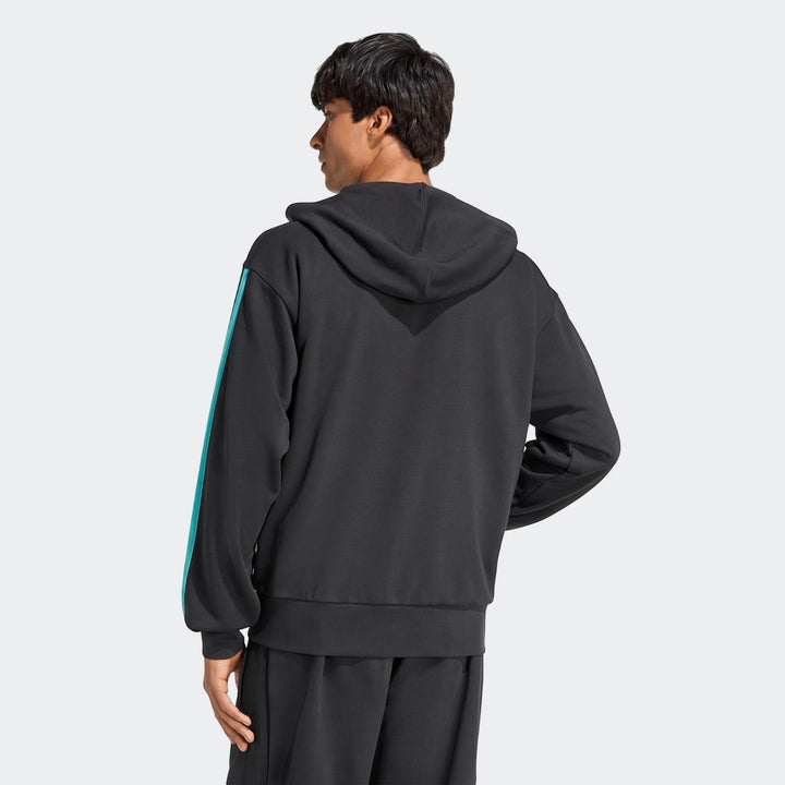 Mercedes-Amg Petronas Formula 1 Team Dna Full-Zip Hoodie in black with a teal stripe, worn by a male model from the back.