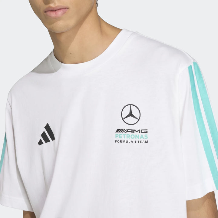 Mercedes-AMG Petronas Formula 1 Team Dna T-Shirt in white, featuring team and Adidas logos, worn by a model.
