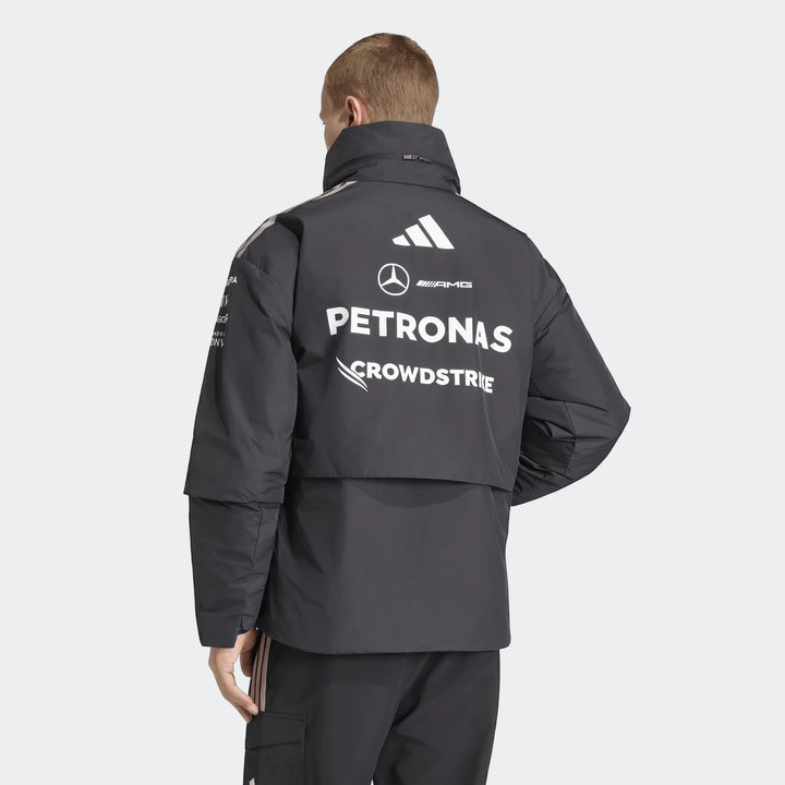 Mercedes-AMG Petronas Formula 1 Team Energy Jacket in dark gray, seen from the back on a male model.