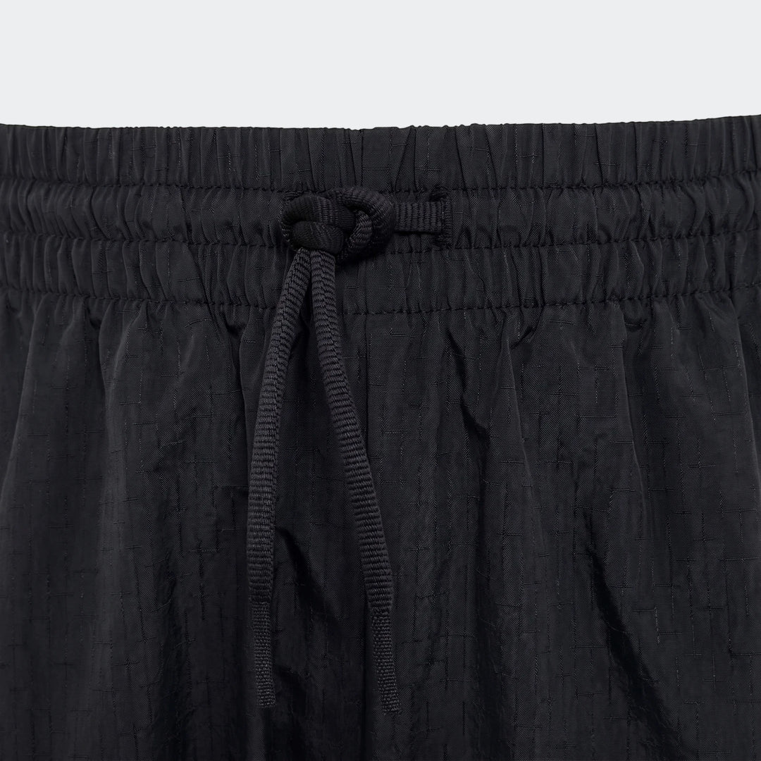 Mercedes-Amg Petronas Formula 1 Team Night Woven Pants Youth, black, featuring an elastic waistband and drawstring detail.