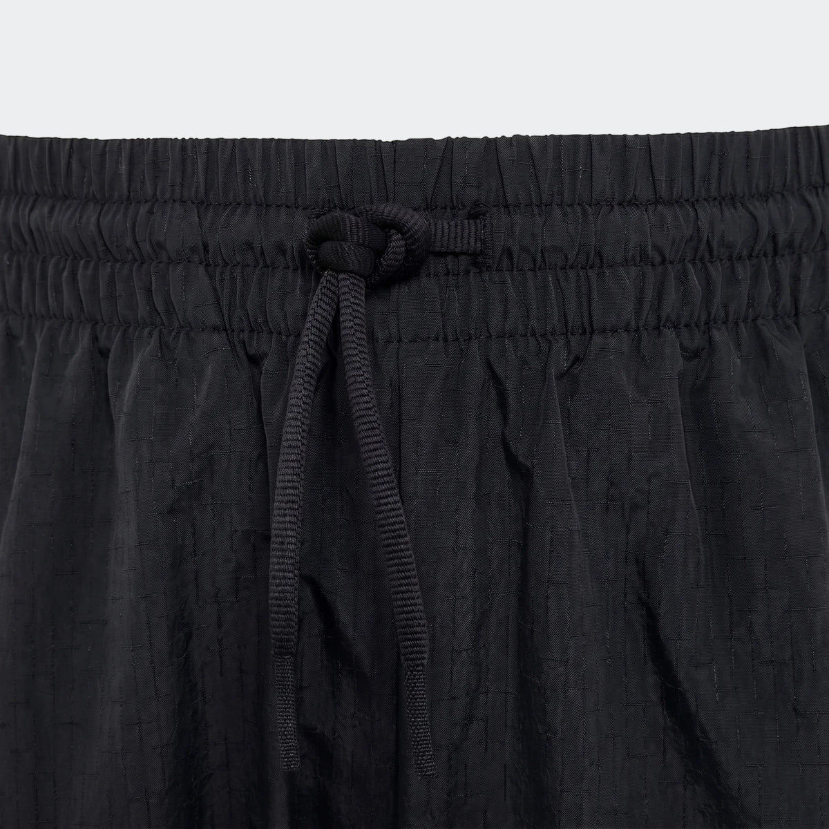 Mercedes-Amg Petronas Formula 1 Team Night Woven Pants Youth, black, featuring an elastic waistband and drawstring detail.