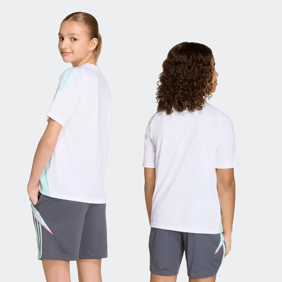 Two youth models wearing white Messi Training Jerseys with mint green stripes and grey athletic shorts, front and back view.