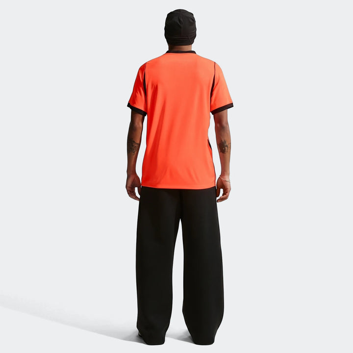 Men's Netherlands National Team 2026 Stadium Home Nike Dri-Fit soccer jersey in vibrant orange, shown in a full back view.