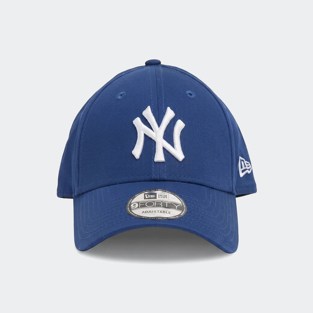 Front view of a blue New Era 9FORTY Todd League Essential baseball cap featuring a white embroidered New York Yankees logo.