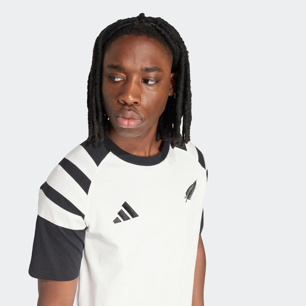 Men's New Zealand Rugby leisurewear t-shirt in black and white with round neck, featuring Adidas and Silver Fern logos, worn