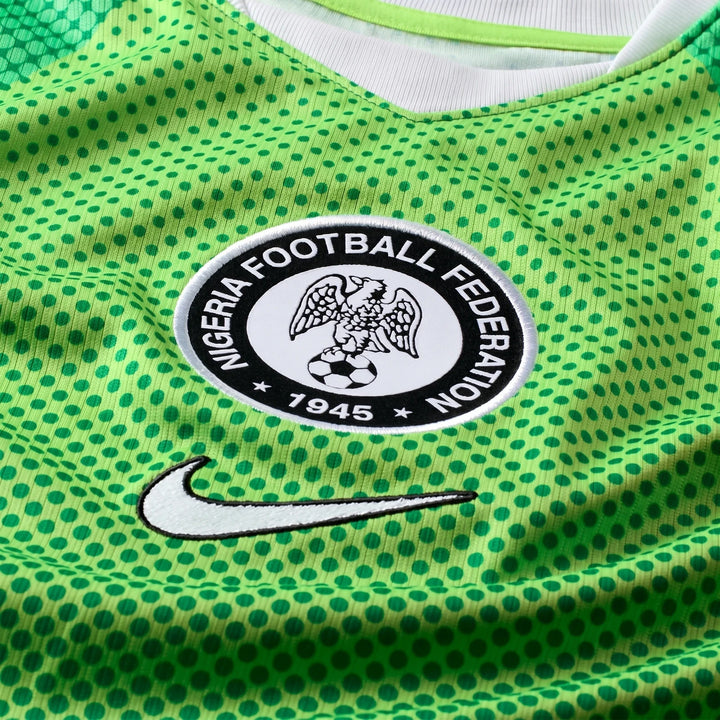 Nigeria 2026 Stadium Home green Nike Dri-Fit soccer short-sleeve jersey with Nigeria Football Federation badge.