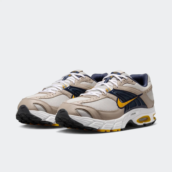 Nike Air Max Moto 2K 2Tone men's shoes in beige, navy, and yellow, showcasing mesh and synthetic construction.