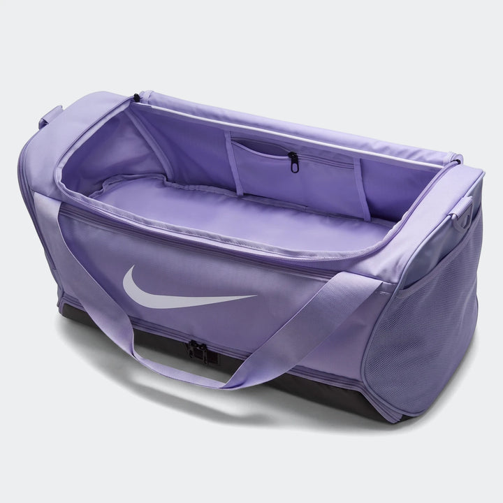 Purple Nike Brasilia 9.5 Medium Duffel Bag shown open, featuring the white Nike swoosh logo and internal organization