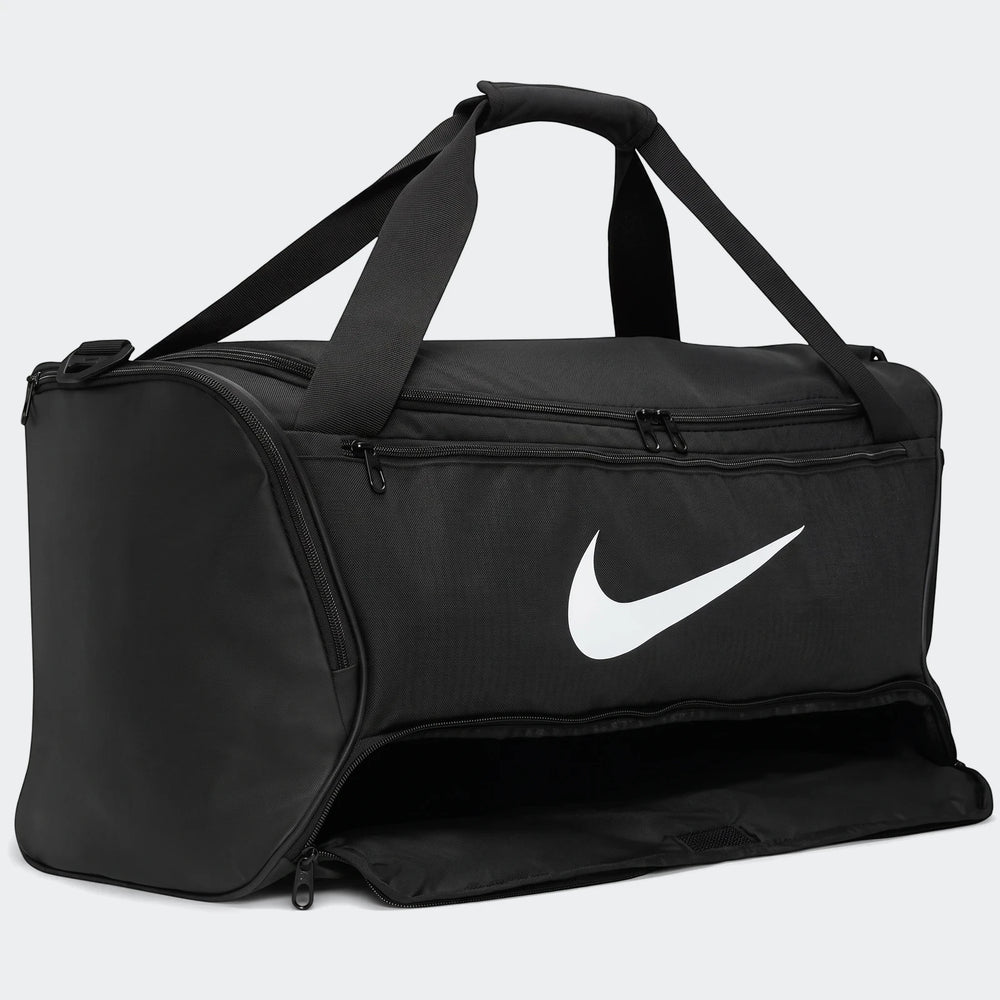 Black Nike Brasilia 95-liter duffel bag with white swoosh logo, top handles, and side pocket zipper, seen from a front angle.