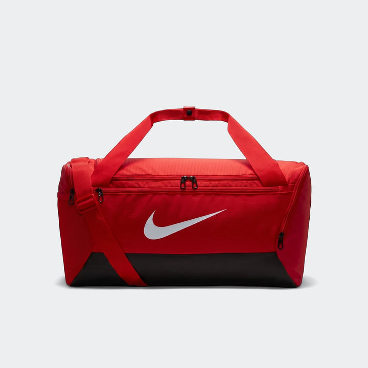 Red and black Nike Brasilia S Duffel Bag 9.5 with a white swoosh logo, shown from the front.