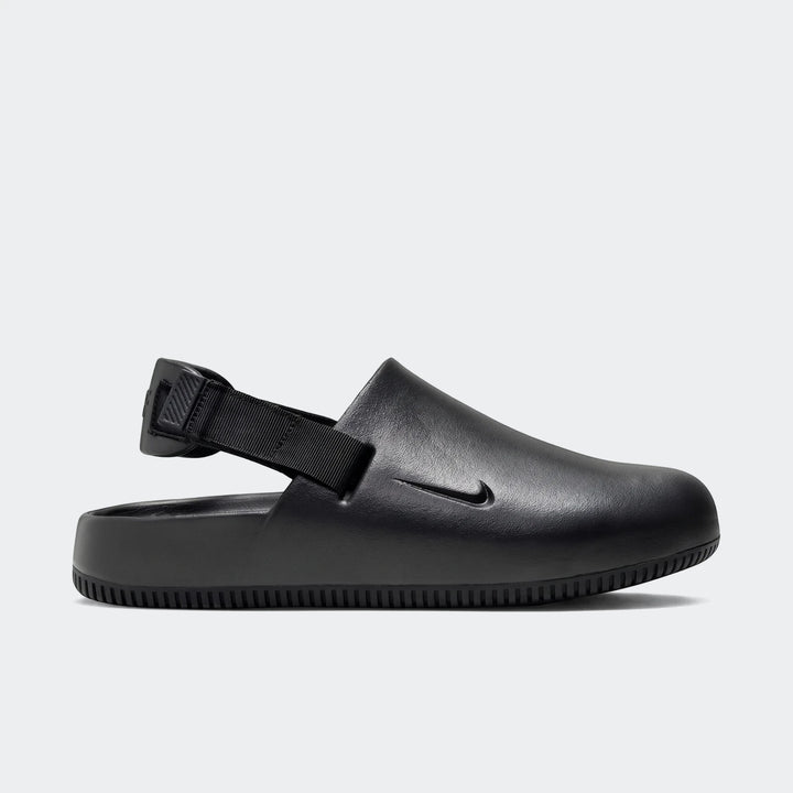 Black Nike Calm men's mule in a side view, featuring an embossed swoosh logo and an adjustable heel strap, ideal for comfort.