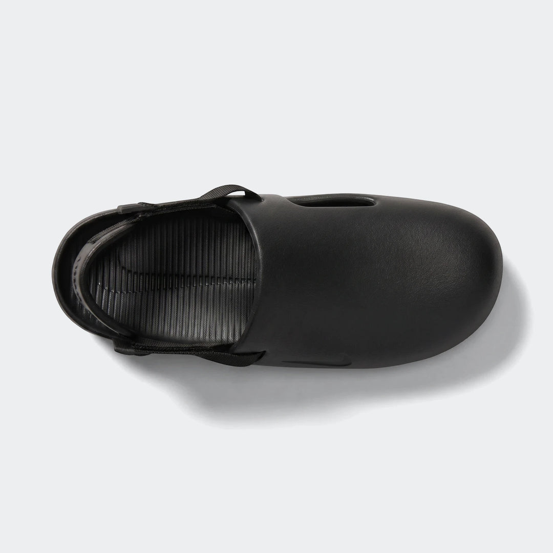 Nike Calm men's mules in black with slip-on molded upper and adjustable heel strap, shown in top view.
