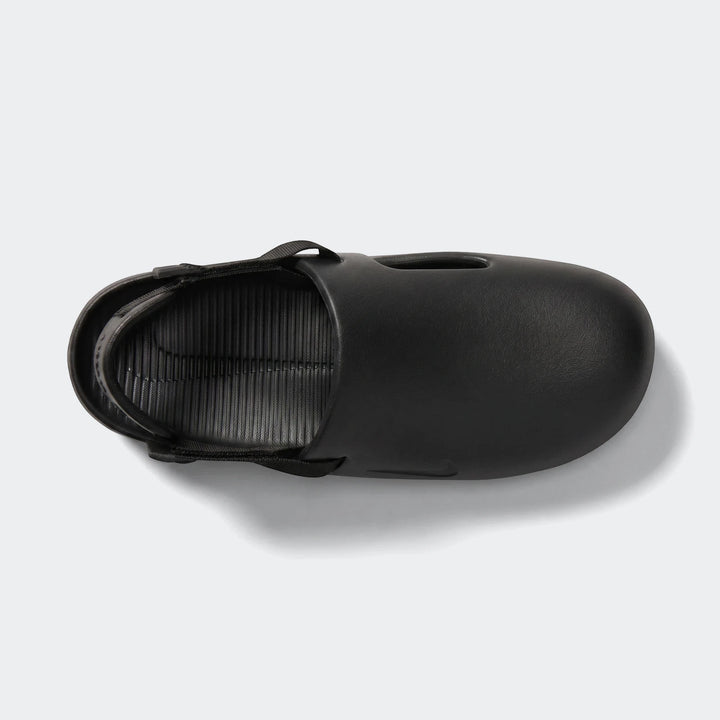 Nike Calm men's mules in black with slip-on molded upper and adjustable heel strap, shown in top view.