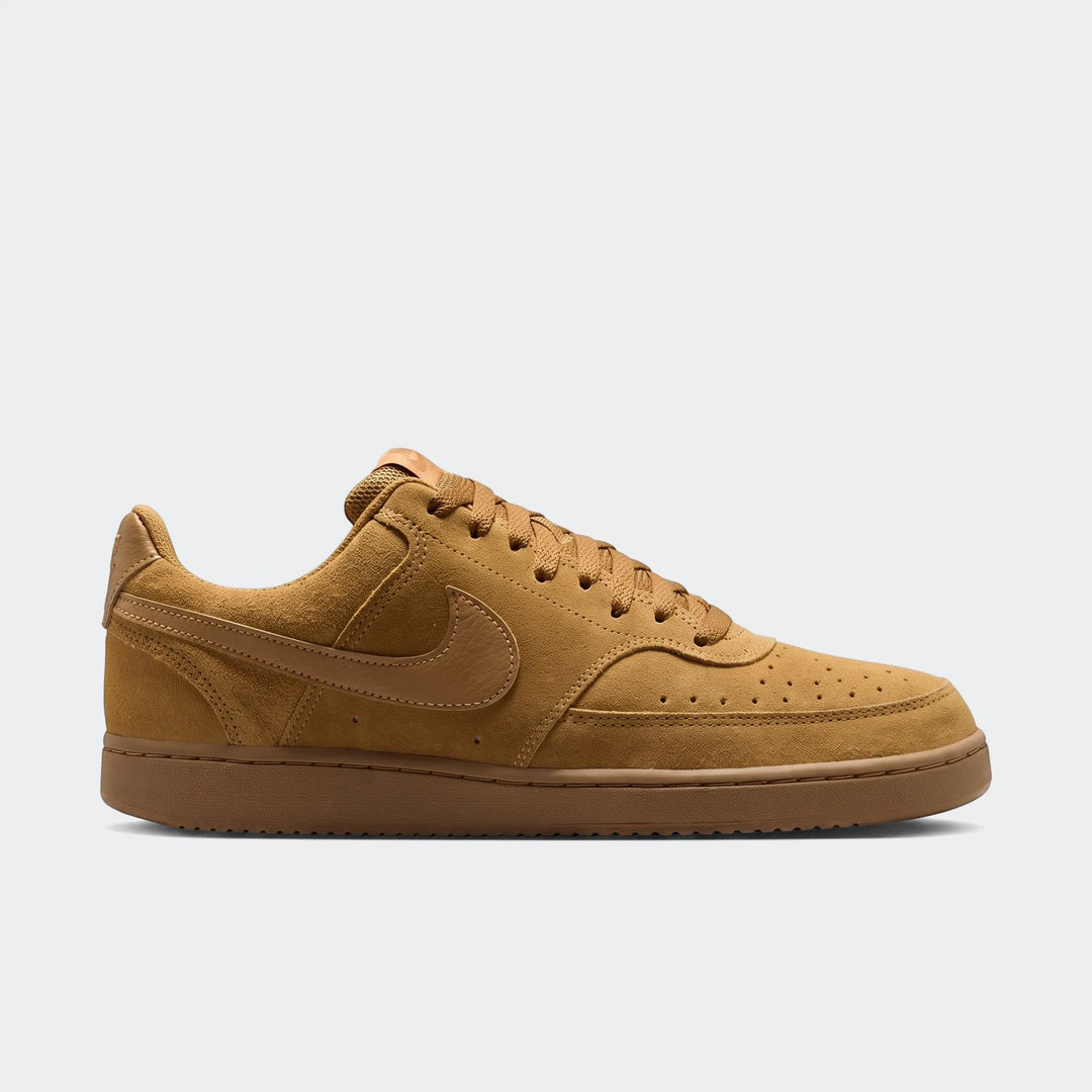 Nike Court Vision Low Suede Premium men's shoes in a rich brown color, featuring a low-top design and visible suede texture,