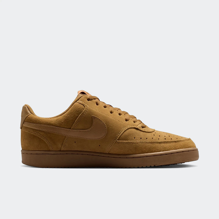 Tan Nike Court Vision Low Suede Premium men's shoes, low-top design, shown in a side view on a white background.