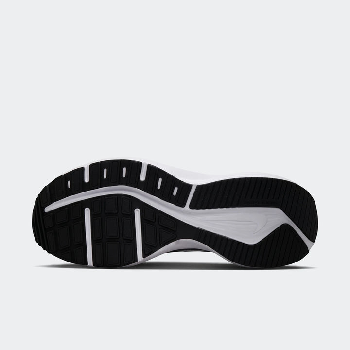 Nike Downshifter 14 men's road running shoe, featuring the black and white sole from a bottom view.