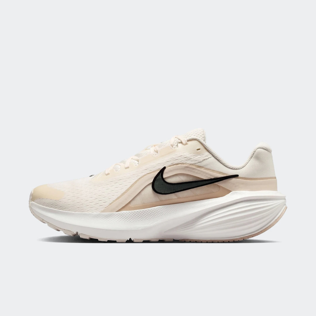 Nike Downshifter 14 White Men's Road Running Shoe in an off-white and cream colorway with a black swoosh, side view.