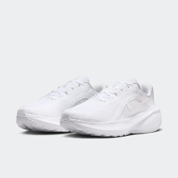 Nike Downshifter 14 white sneakers with breathable mesh upper and cushioned sole, pair shown in side view.