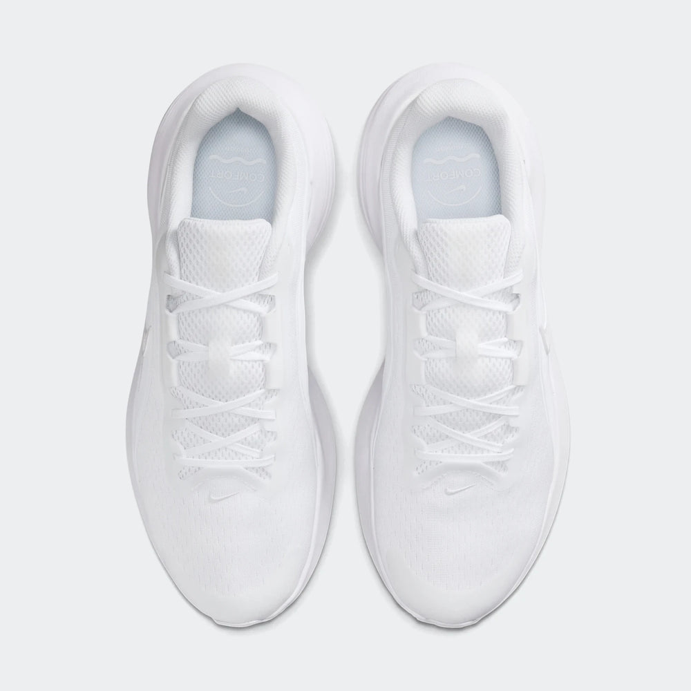 Pair of white Nike Downshifter 14 athletic sneakers in a top-down view, showcasing laces and mesh upper.