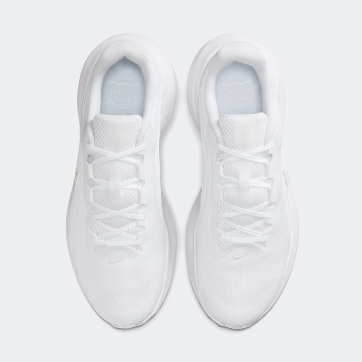 Pair of white Nike Downshifter 14 athletic sneakers in a top-down view, showcasing laces and mesh upper.