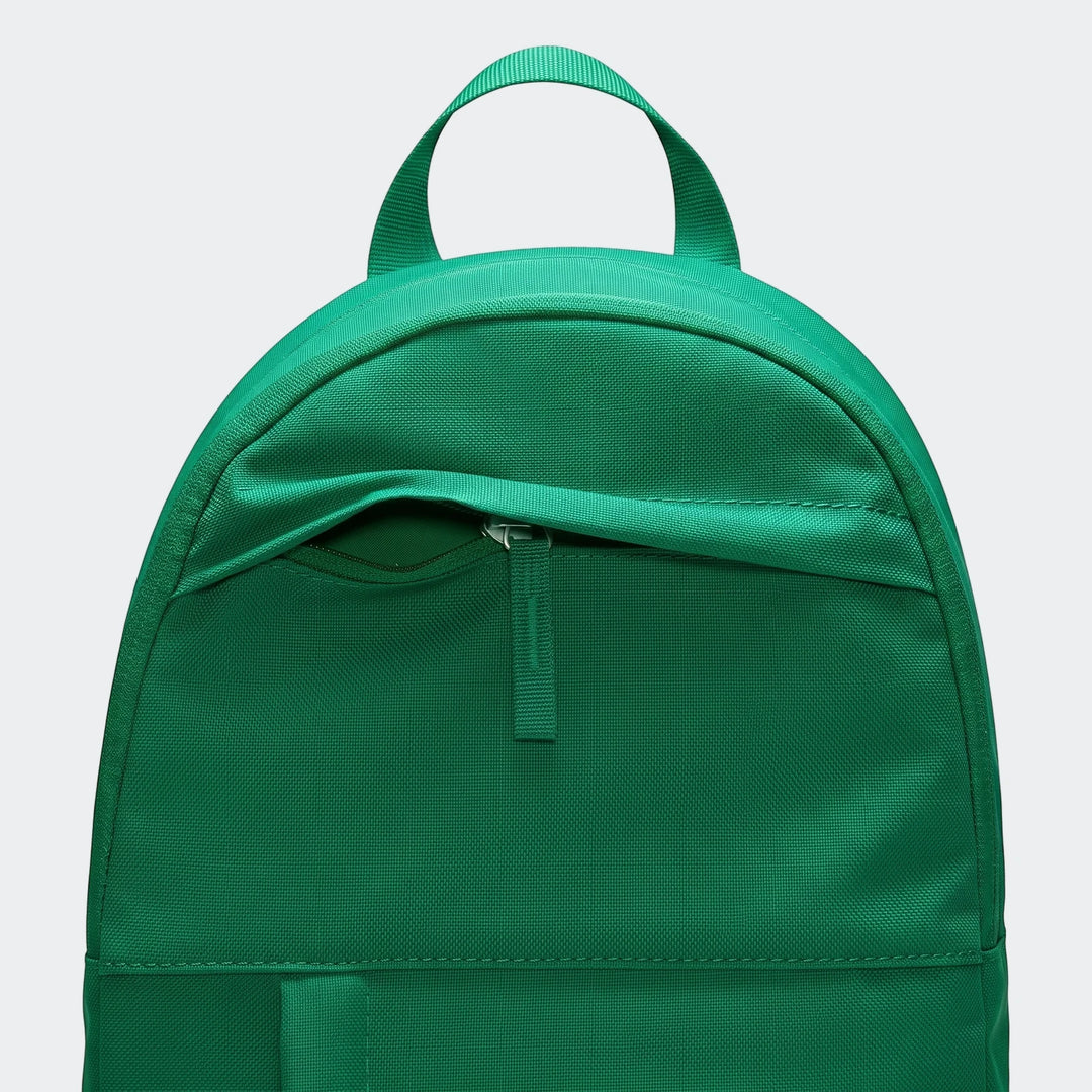 Close-up view of a vibrant green Nike Elemental Backpack with a visible front zipper pocket and top carry handle.