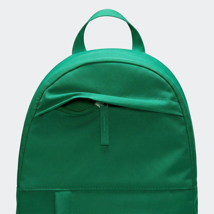 Close-up view of a vibrant green Nike Elemental Backpack with a visible front zipper pocket and top carry handle.
