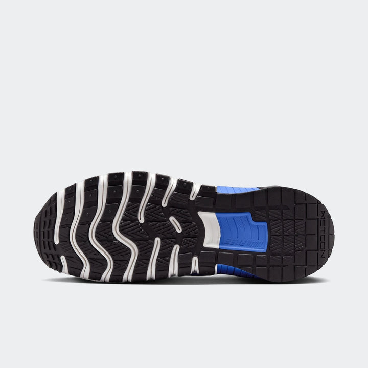 Sole view of a Nike Free Metcon 6 sneaker with black, white, and blue sole patterns, designed for training and cross-fit.