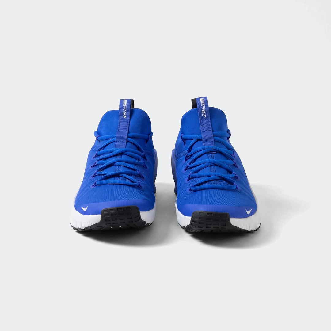 Front view of Nike Free Metcon 6 blue sneakers, featuring a vibrant blue upper, white midsole, and black outsole, designed