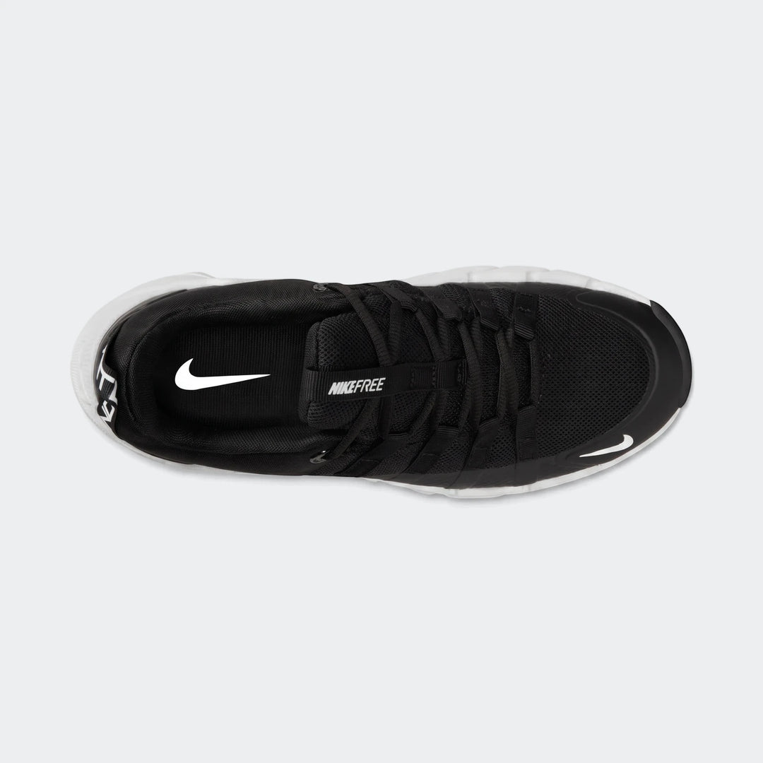 Top-down view of a black Nike Free Metcon 7 women's training shoe with a white sole, featuring Nike swoosh logos and