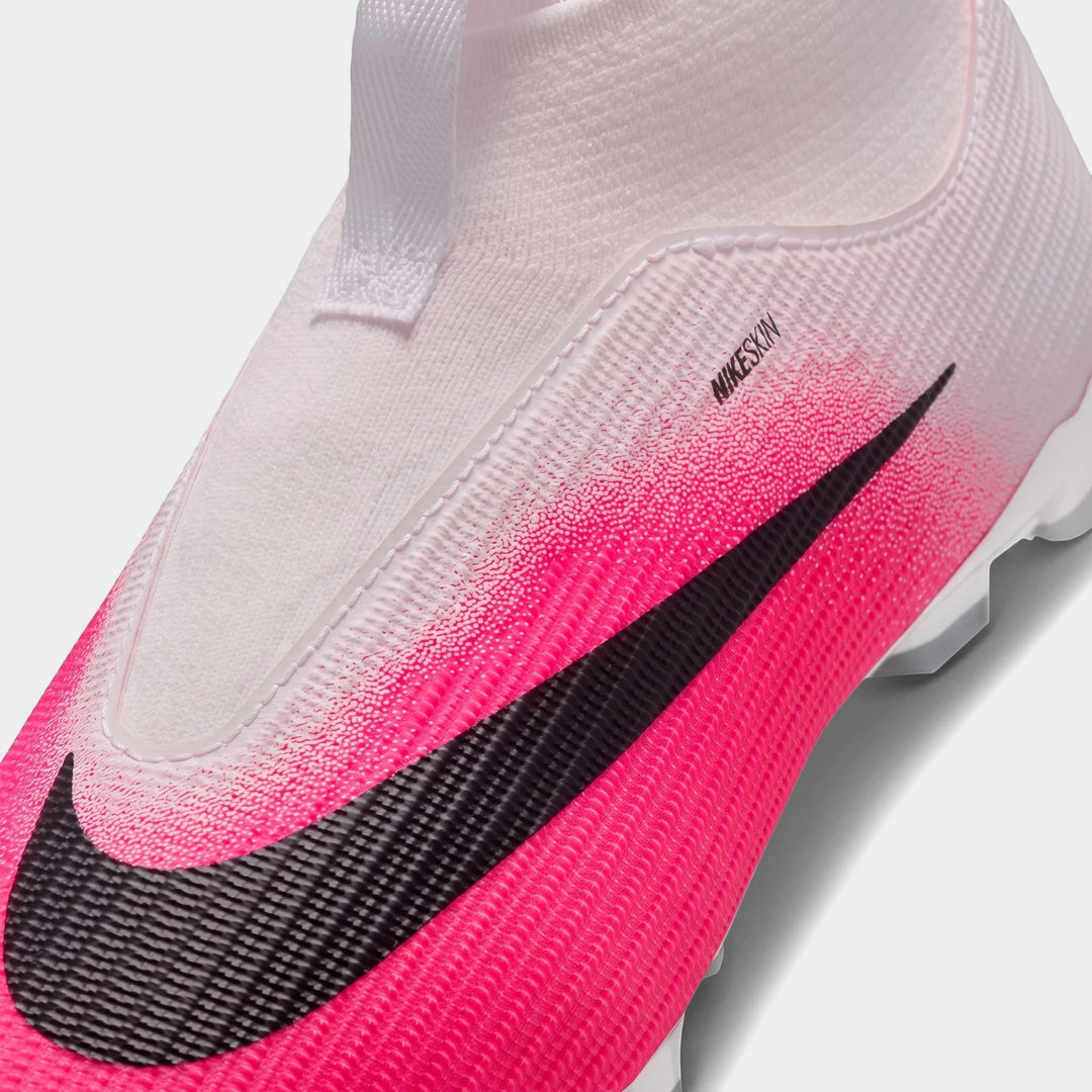Nike Jr. Mercurial Superfly 11 Academy Big Kids' Multi-Ground High-Top Soccer Cleat in vibrant pink, white, and black with a