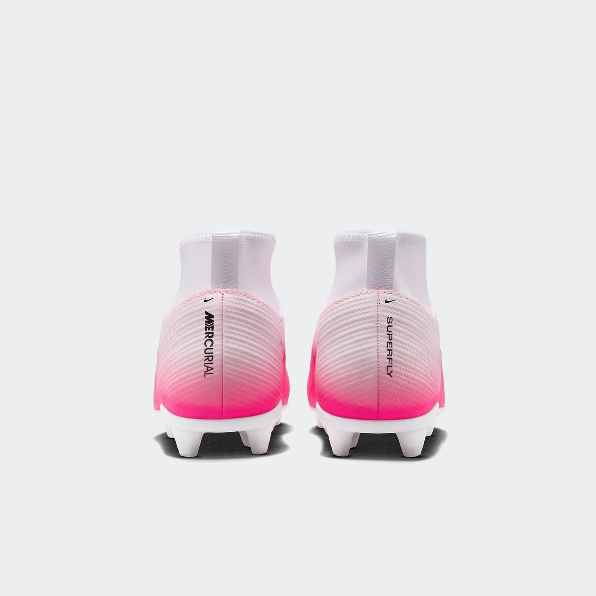 Back view of two Nike Jr. Mercurial Superfly 11 Club Big Kids' high-top soccer cleats in white and hot pink.