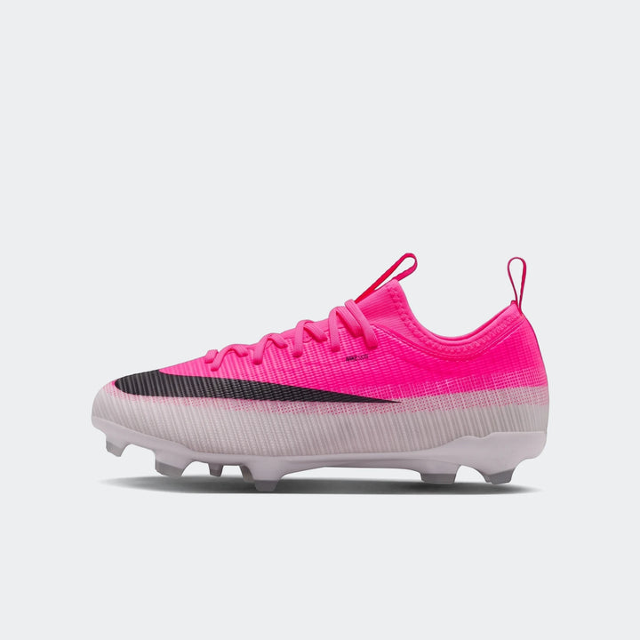 Nike Jr. Mercurial Vapor 17 Academy Big Kids' Multi-Ground Low-Top Soccer Cleats in vibrant pink and white, side view.