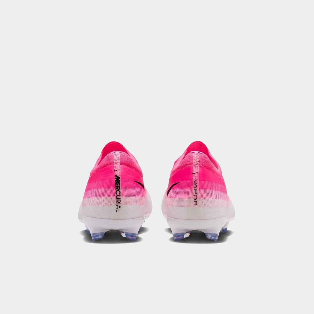 Nike Jr. Mercurial Vapor 17 Pro Big Kids' firm-ground low-top soccer cleats in pink and white, shown from the rear view.