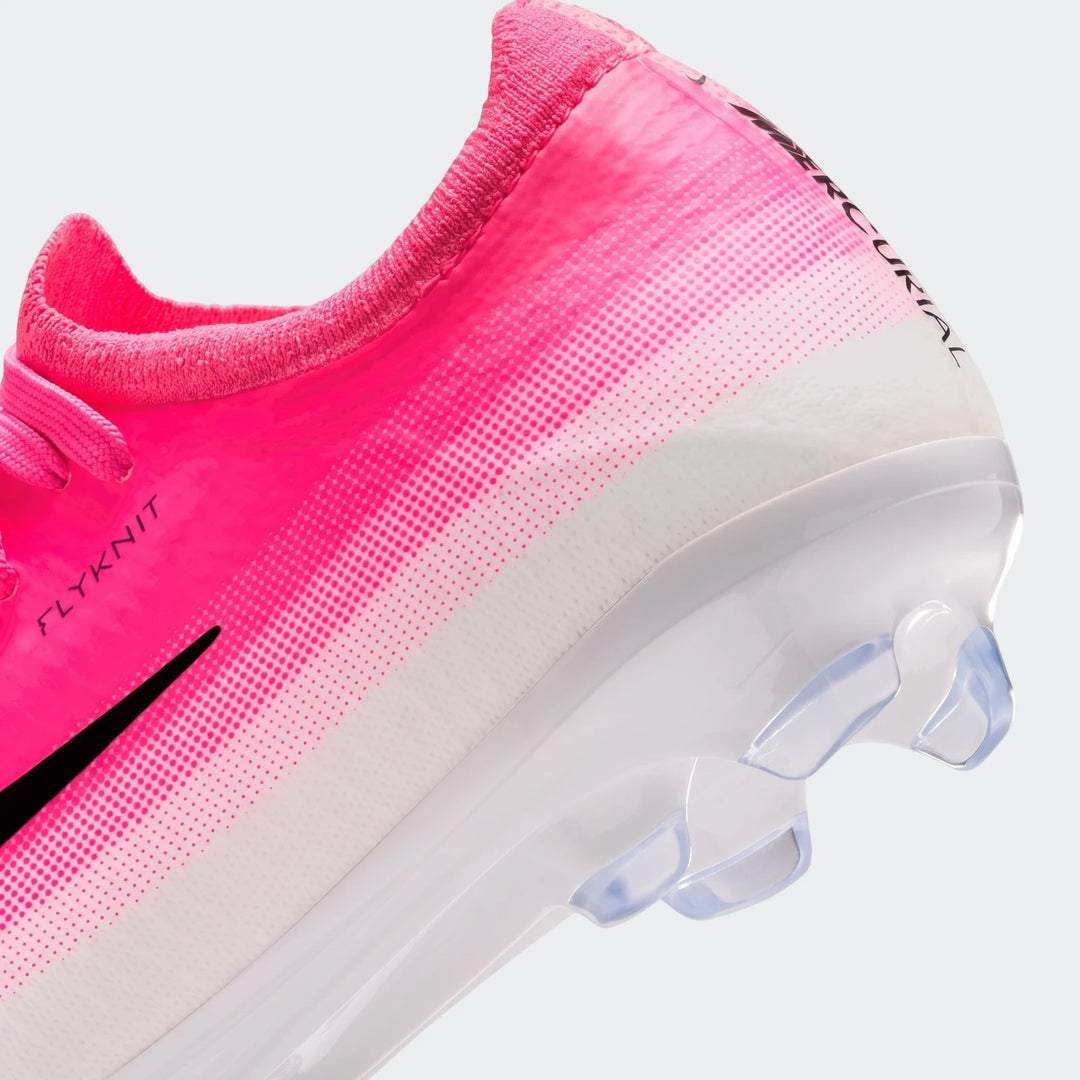 Close-up of a pink and white Nike Jr. Mercurial Vapor 17 Pro Big Kids' firm-ground soccer cleat with Flyknit upper and