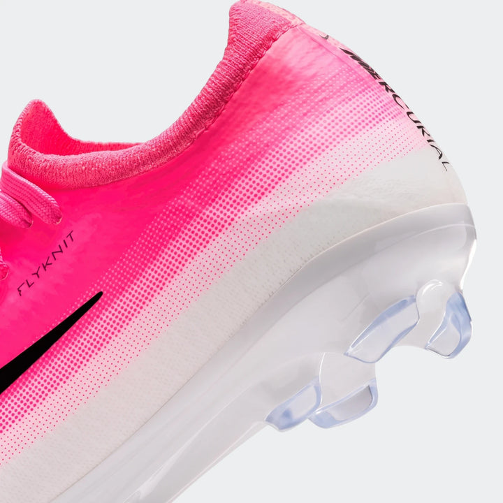 Close-up of a pink and white Nike Jr. Mercurial Vapor 17 Pro Big Kids' firm-ground soccer cleat with Flyknit upper and