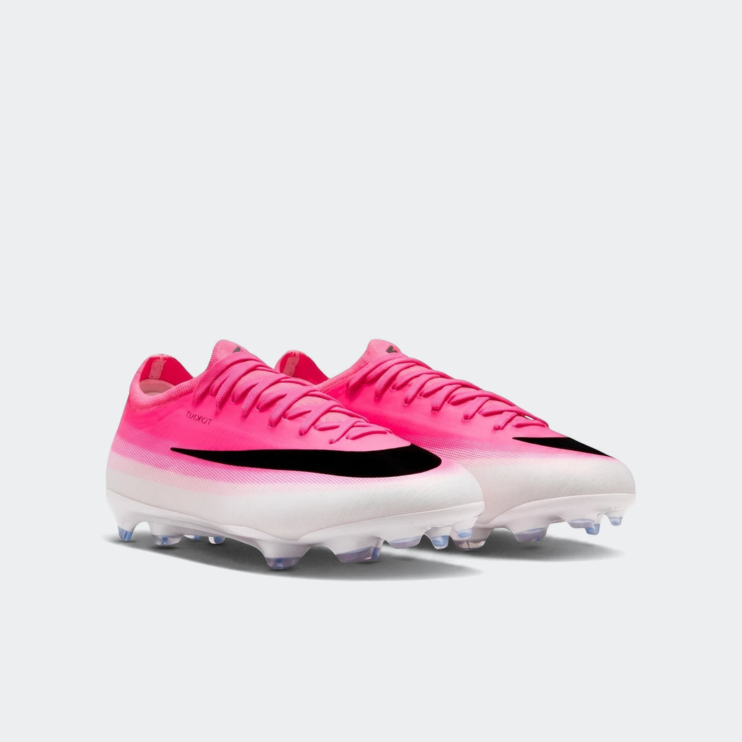 Pink and white Nike Jr. Mercurial Vapor 17 Pro Big Kids' Firm-Ground Low-Top Soccer Cleats.