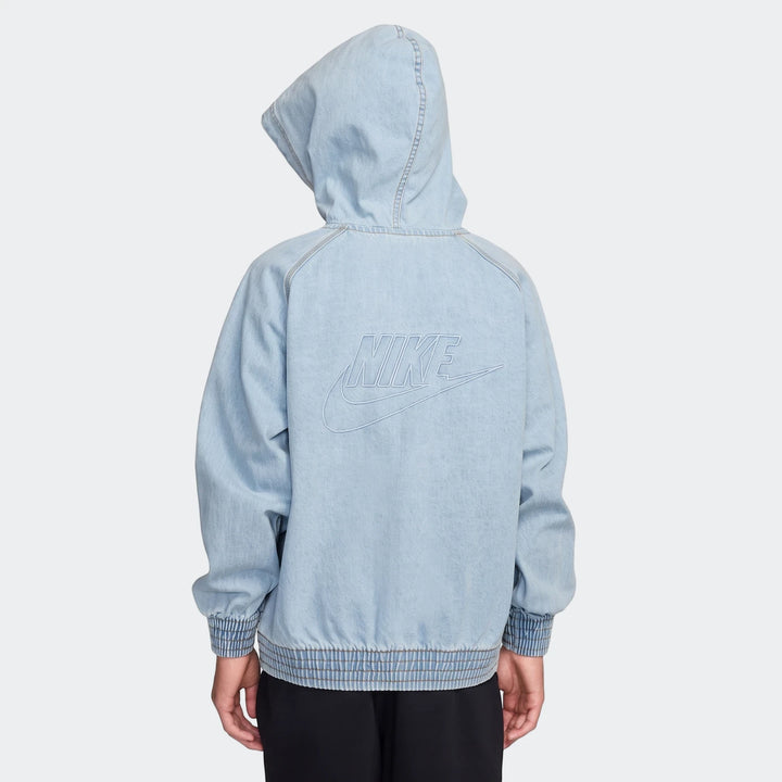 Light blue Nike K Nsw Wr Denim Fz Jacket, seen from the back, featuring a hood and an embroidered Nike logo on the upper