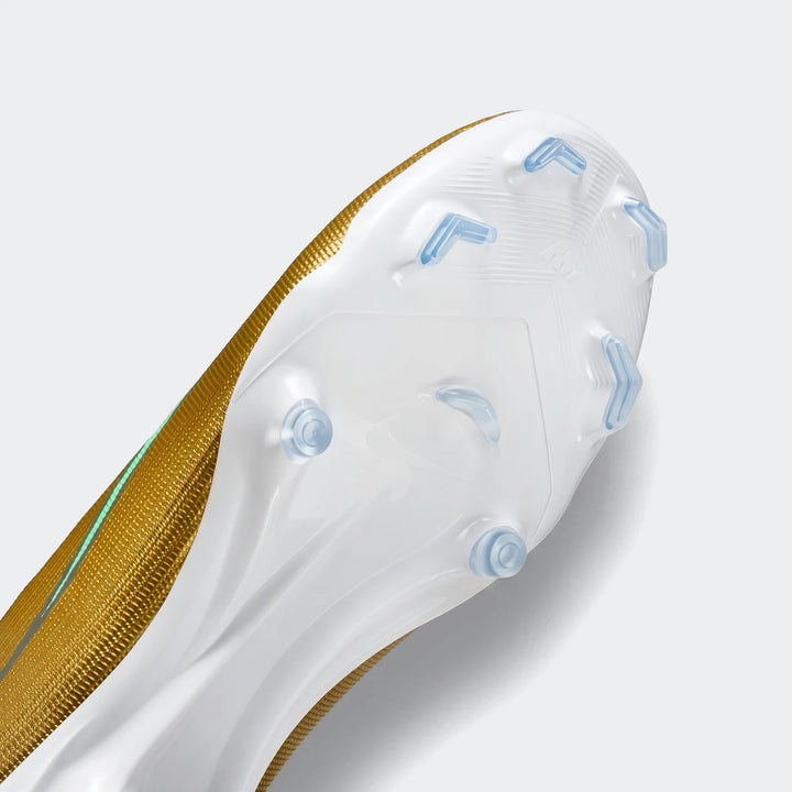 Nike Mercurial Superfly 11 Academy soccer cleat, gold and white, showing the sole with light blue multi-ground studs.
