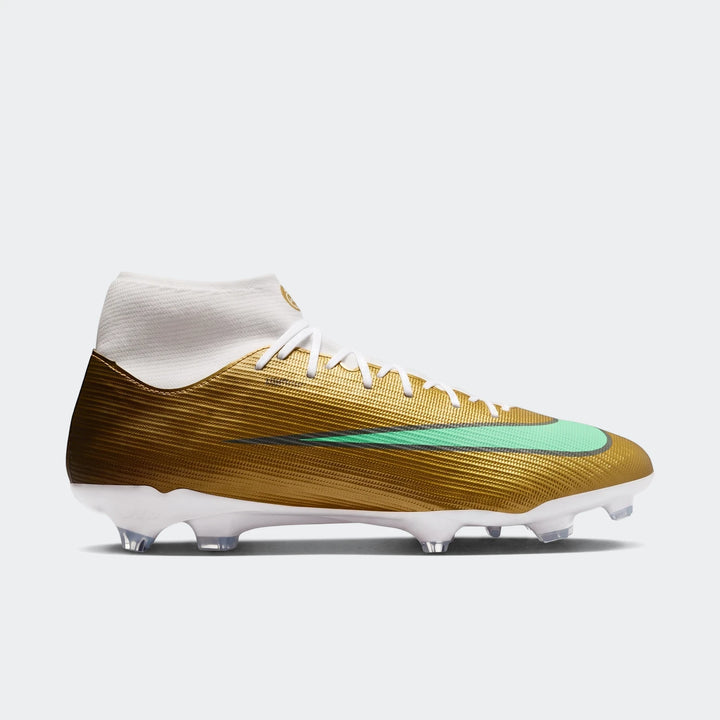 A Nike Mercurial Superfly 11 Academy Kylian Mbappé high-top soccer cleat in gold with a mint green swoosh, shown from the