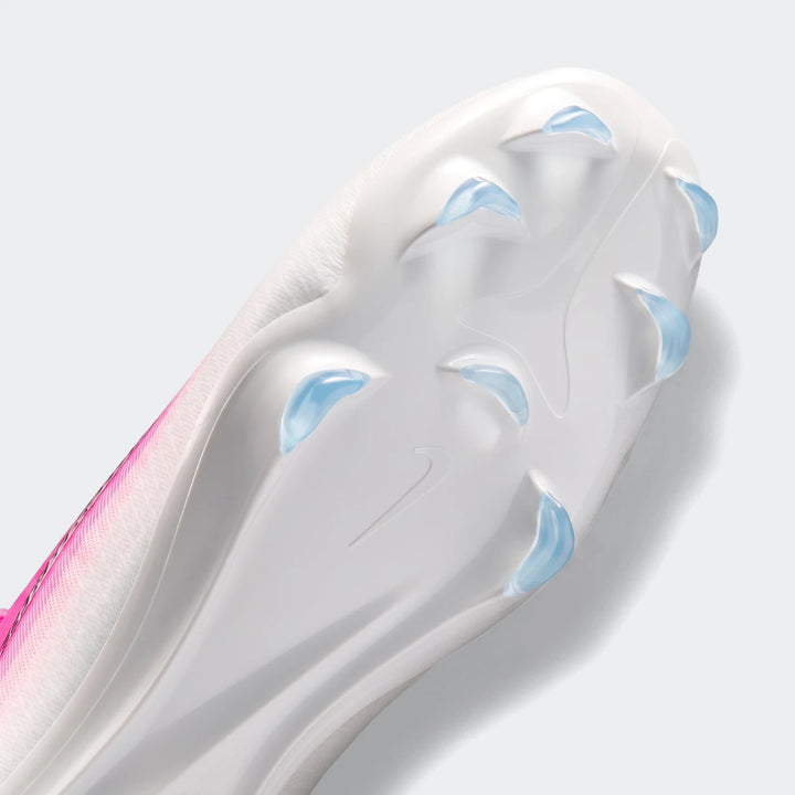 Nike Mercurial Vapor 17 Pro firm-ground low-top soccer cleat, in white and pink, showcasing its sole with translucent blue