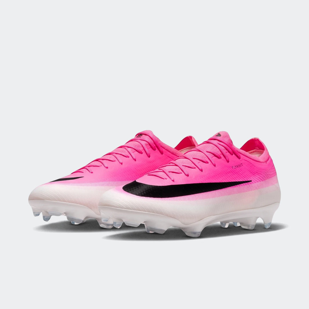 Nike Mercurial Vapor 17 Pro Firm-Ground Low-Top Soccer Cleats in bright pink and white with a black swoosh, shown from a
