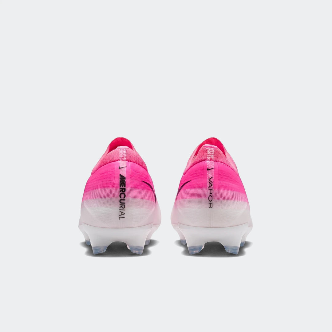 Nike Mercurial Vapor 17 Pro firm-ground low-top soccer cleats in pink and white, shown from the rear view.