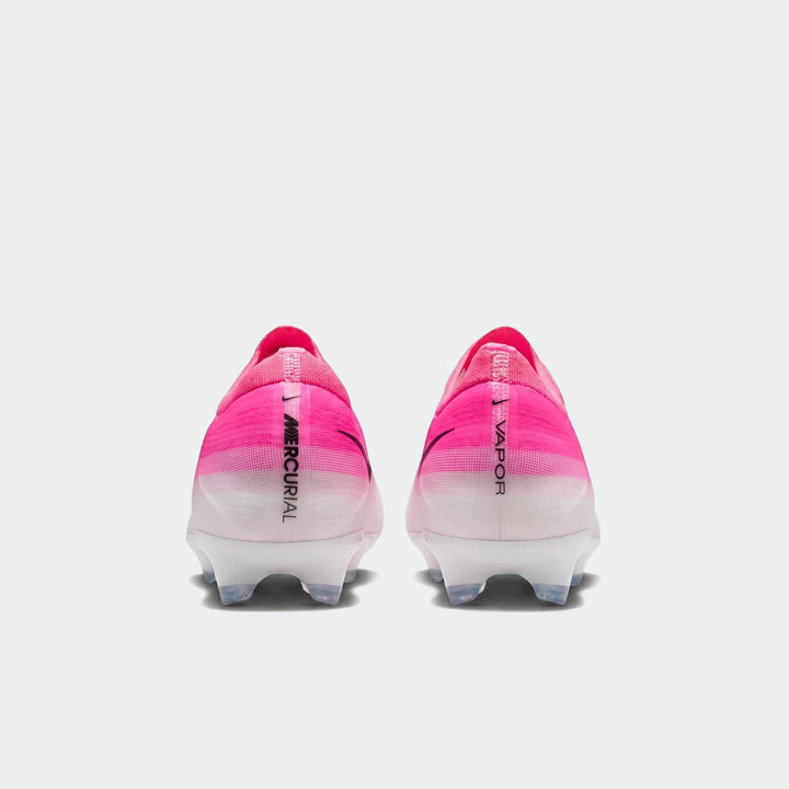 Nike Mercurial Vapor 17 Pro firm-ground low-top soccer cleats in pink and white, shown from the rear view.