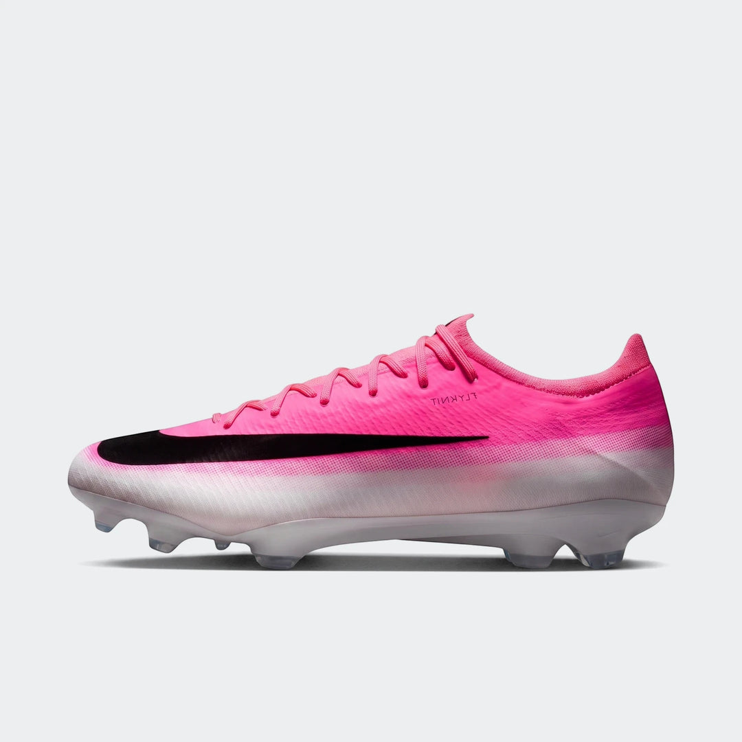 Nike Mercurial Vapor 17 Pro Firm-Ground Low-Top Soccer Cleats in a vibrant pink and white gradient with black swoosh, side